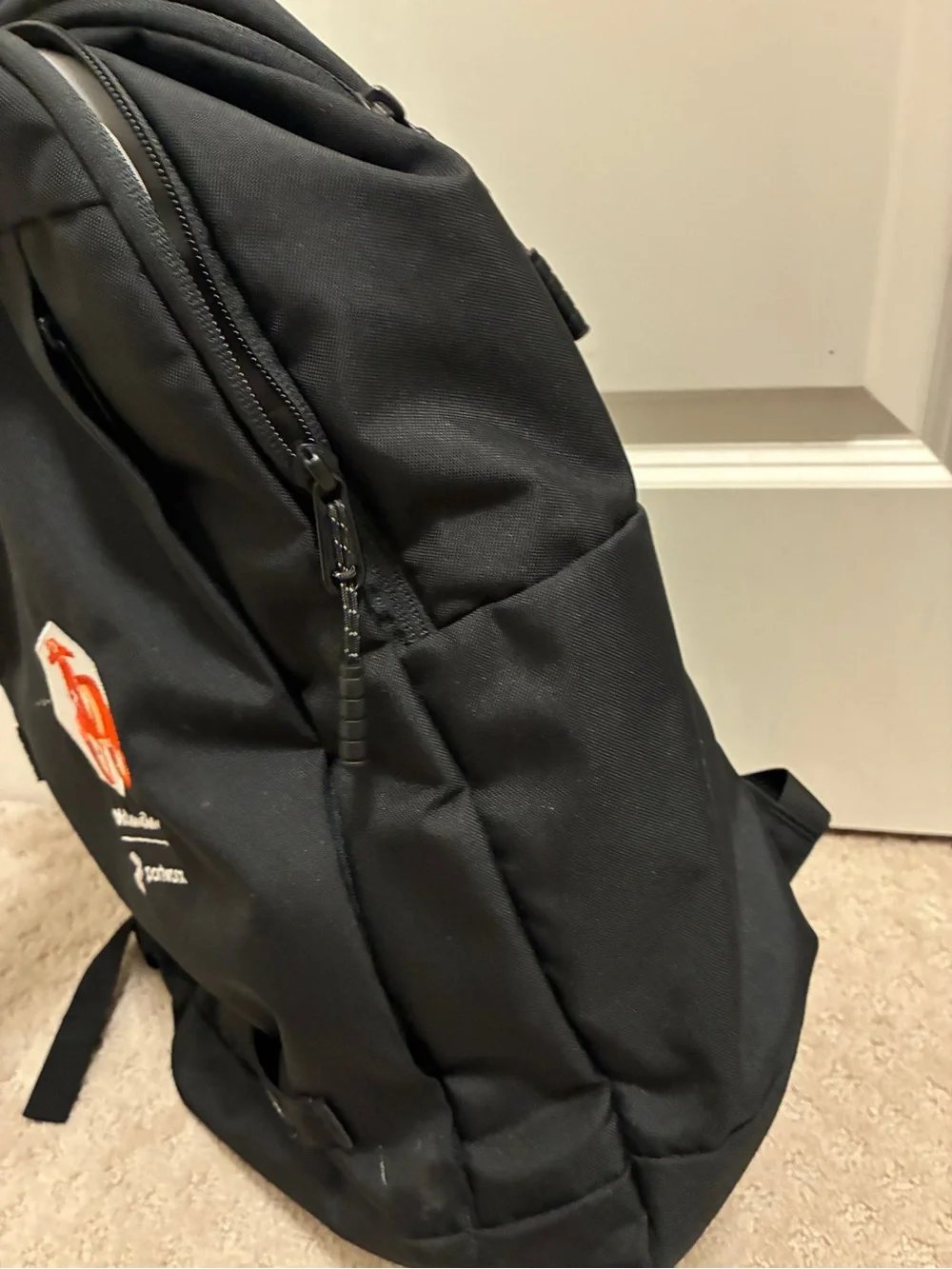 Timbuk2 Black Backpack with Orange Valencia Graphic